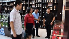 自治区考评组到我校仙葫校区开展中医药健康旅游示范基地现场评审工作