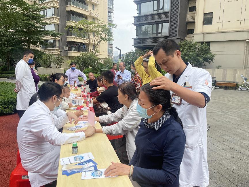 活动现场,中壮医特色技法受青睐 活动现场,中壮医特色技法受青睐